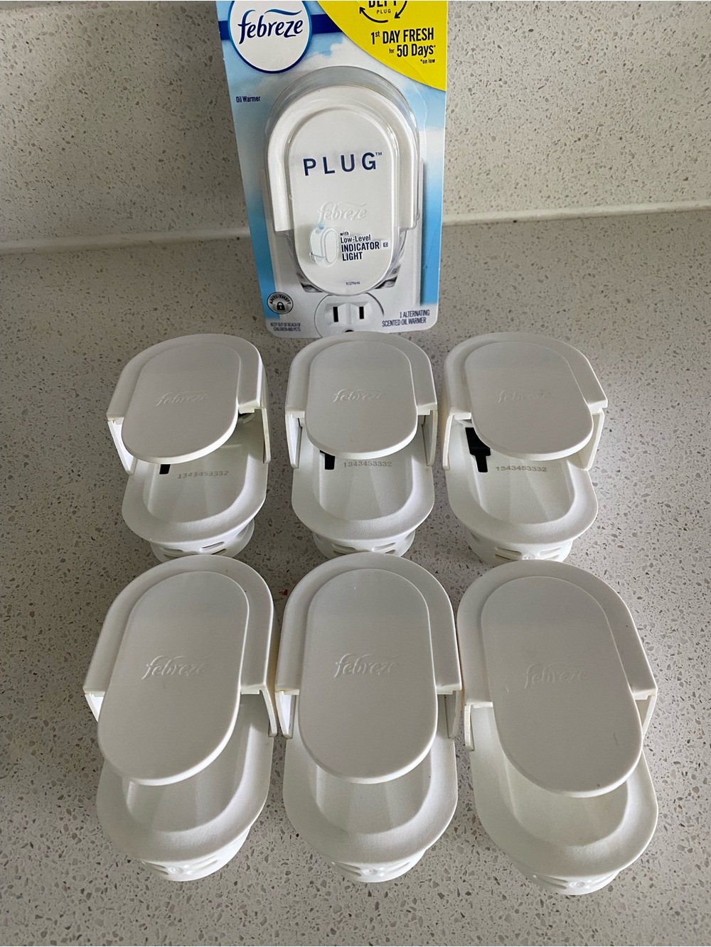 7 febreze plug in air refresher ( 1 new, 6 used )
